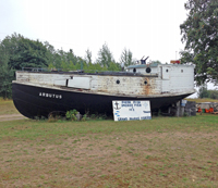 The fish tug Arbutus advertising fish in Grand Marais, September 2014 